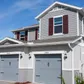 Two story home painted by Glades Pro